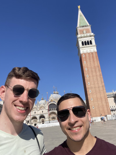 Selfie of Jacob and Scott with the Basilica and Campinale di San Marco in the background