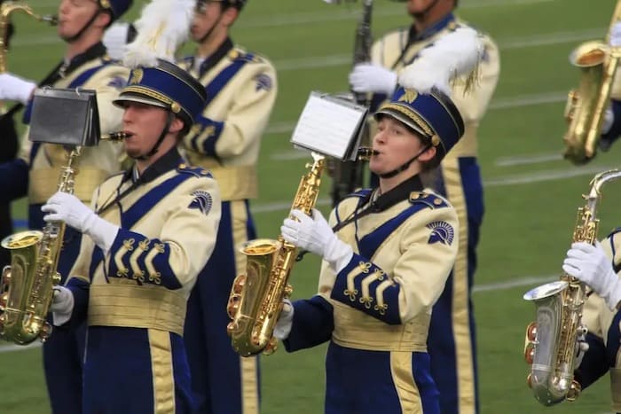 Photo of college marching band members